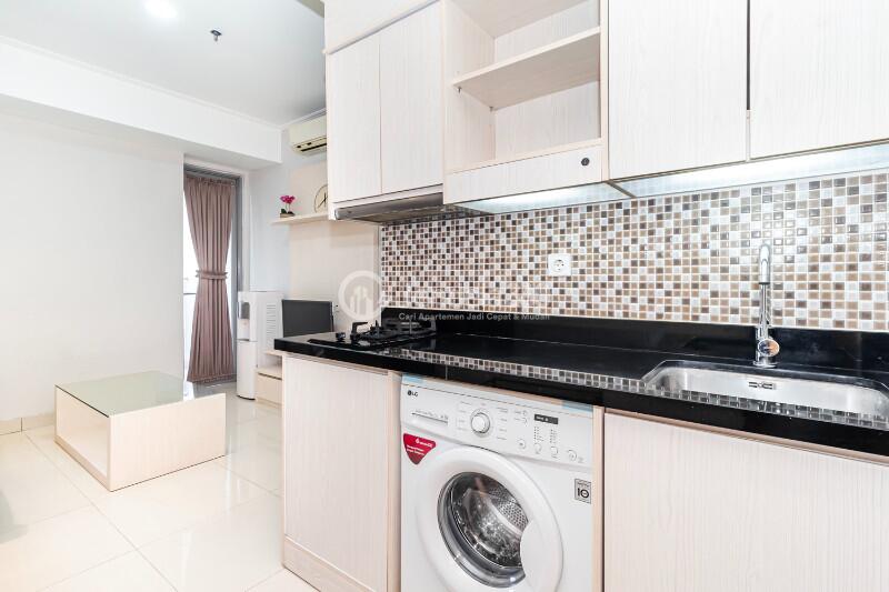Kitchen High Floor 2BR Apartment with city View at The Mansion Kemayoran Bougenville