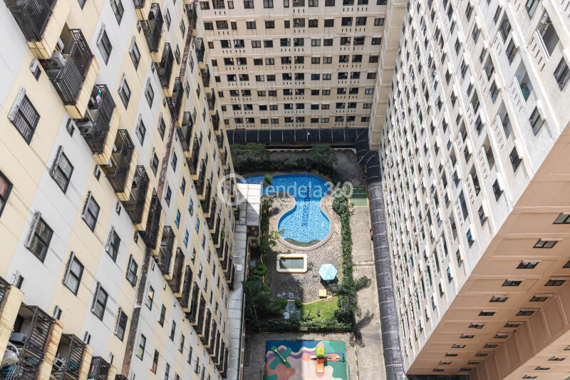 Balcony High Floor Studio Apartment with City & Pool View at Kebagusan City Apartment