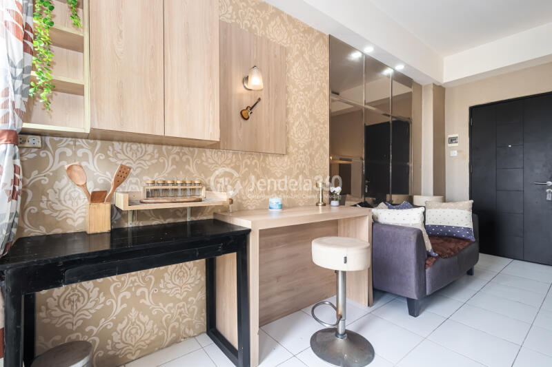 Bedroom High Floor Studio Apartment with City & Pool View at Kebagusan City Apartment