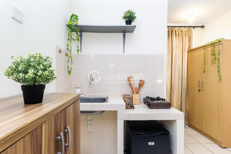 Kitchen Middle Floor Studio Apartment with river and city view View at Puri Park View Apartment