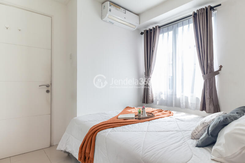 Bedroom 1 Well Located 2BR Apartment Only 15 Mins to Kota Kasablanka Mall with Pool View at Bassura City Apartment