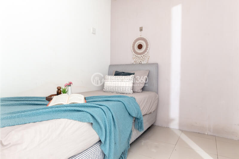 Bedroom 2 Well Located 2BR Apartment Only 15 Mins to Kota Kasablanka Mall with Pool View at Bassura City Apartment