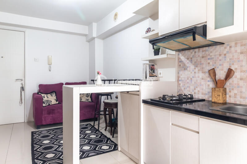 Kitchen Well Located 2BR Apartment Only 15 Mins to Kota Kasablanka Mall with Pool View at Bassura City Apartment