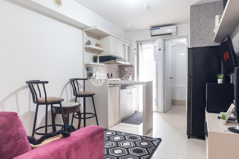Living Room Well Located 2BR Apartment Only 15 Mins to Kota Kasablanka Mall with Pool View at Bassura City Apartment
