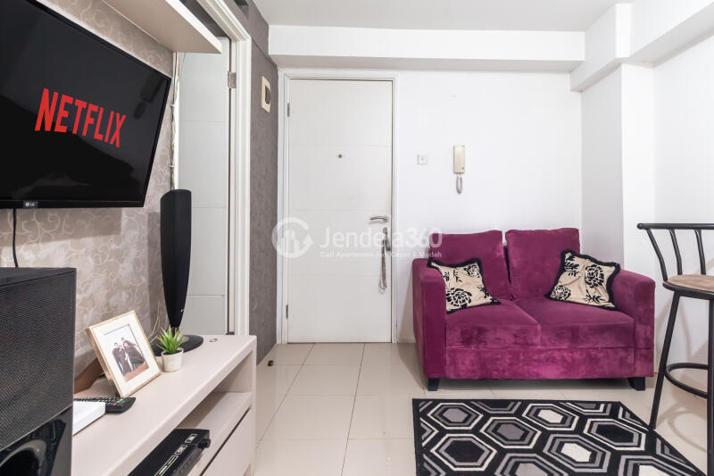 Living Room Well Located 2BR Apartment Only 15 Mins to Kota Kasablanka Mall with Pool View at Bassura City Apartment