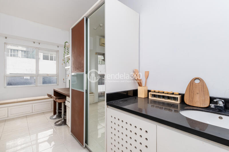 Kitchen Affordable Studio Apartment for College Student with City View at Taman Melati Margonda Apartment